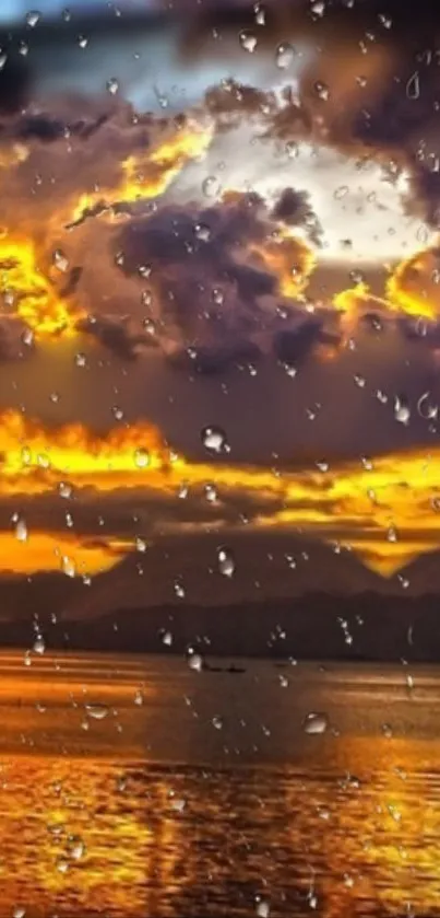 Dramatic sunset over ocean with vibrant orange and blue clouds reflecting on water.