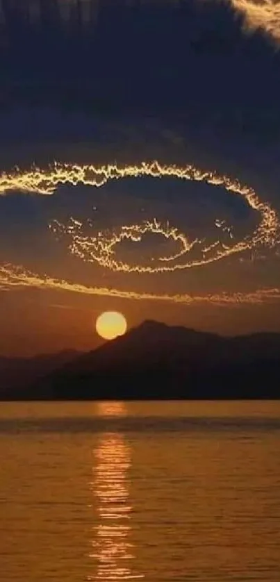 Stunning sunset with spiral clouds over a serene ocean horizon.