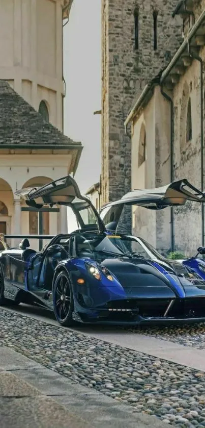 Supercar parked on cobblestone street by heritage building.