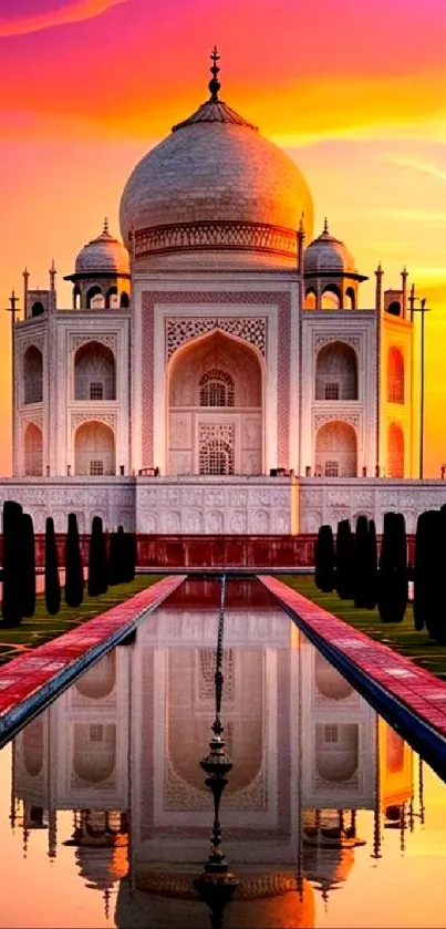 Taj Mahal at sunset with vibrant colors and reflection.