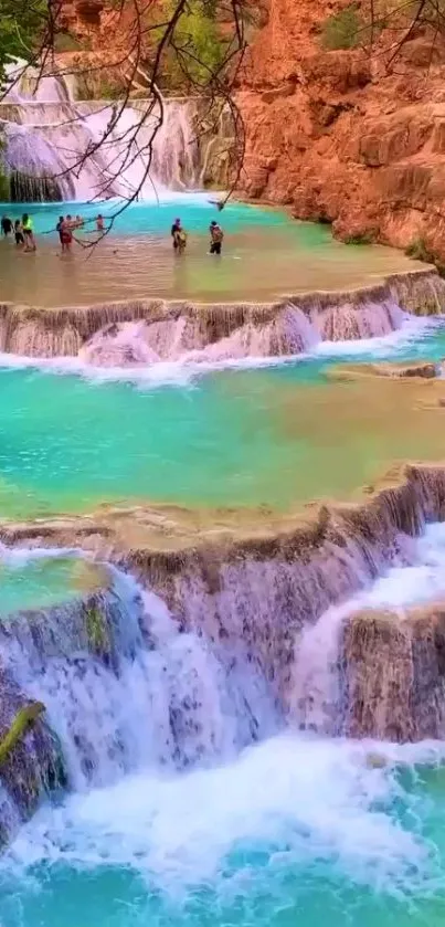 A stunning turquoise waterfall with cascading layers in a natural setting.