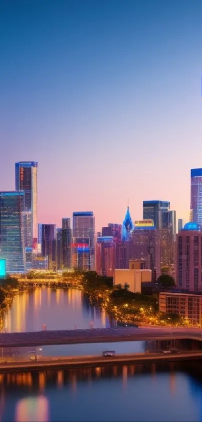 Vibrant city skyline at twilight with neon lights reflecting on water.