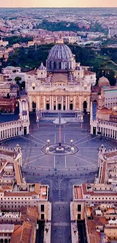 Aerial view of Vatican City's St. Peter's Basilica at sunset.