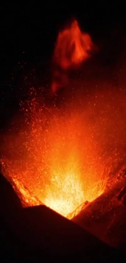 Fiery volcanic eruption with glowing red lava against a dark background.