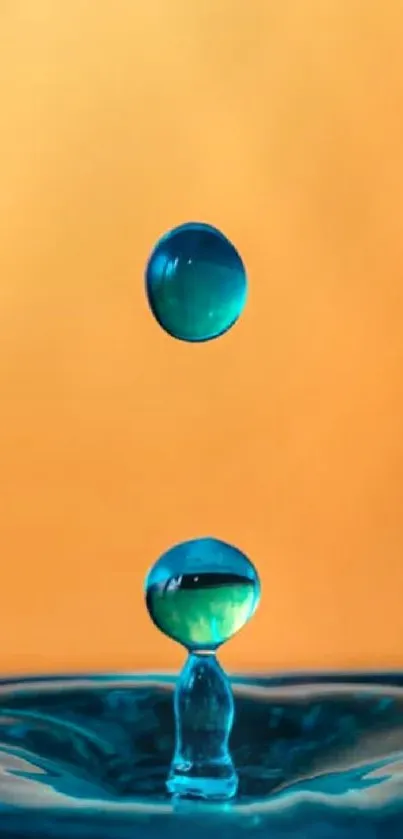 Water drop with orange backdrop mobile wallpaper.