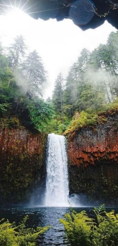 Majestic waterfall surrounded by lush green forest.