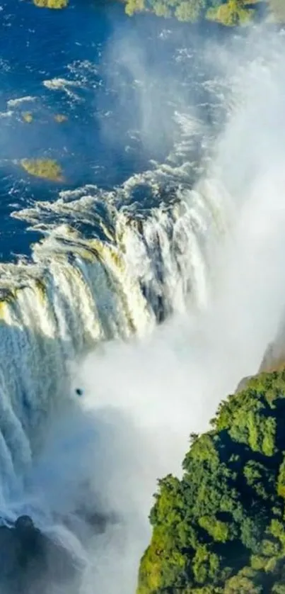 Majestic waterfall cascading into a lush, green valley.