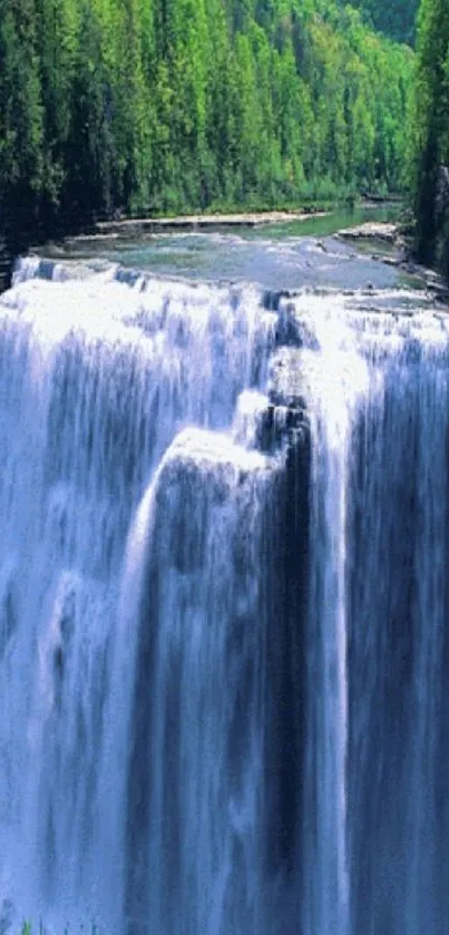 Majestic waterfall surrounded by lush greenery.