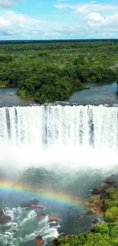 Waterfall cascading with a rainbow, lush greenery around, serene nature view.