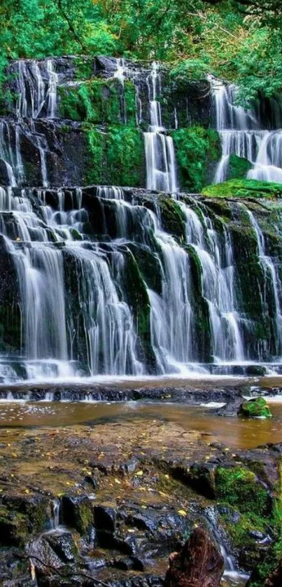 Majestic waterfall in lush green forest mobile wallpaper.