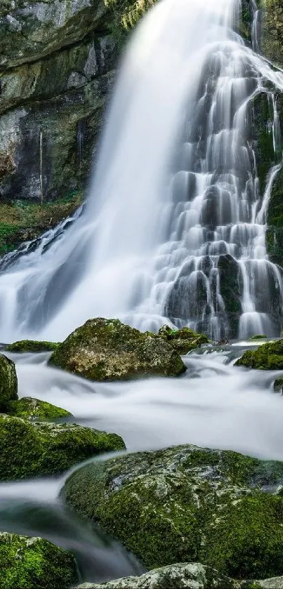 A breathtaking waterfall in a lush green forest with flowing water over rocks.