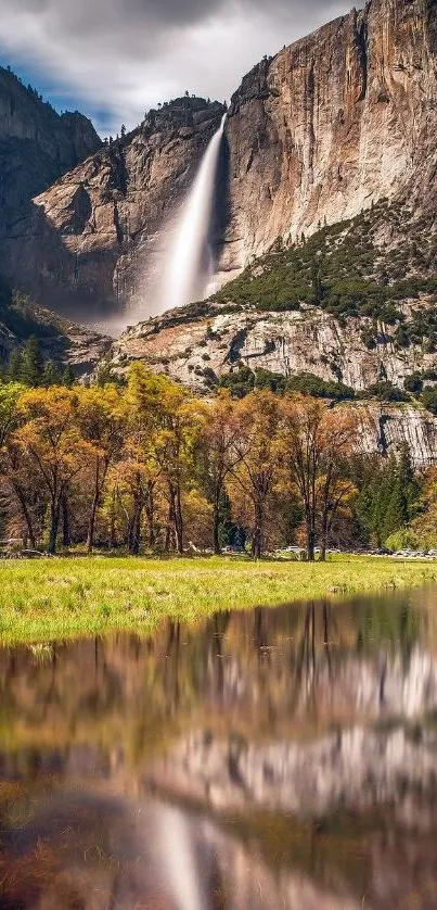 Majestic waterfall and mountain reflected in a tranquil lake.