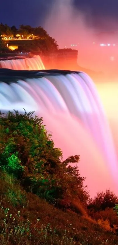 Colorful waterfall with vibrant lights at night scene.