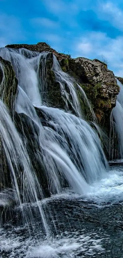 A stunning waterfall with vibrant blue skies, perfect for mobile wallpaper.