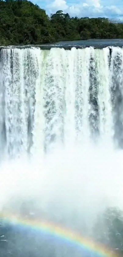 Majestic waterfall with rainbow effect on phone wallpaper.