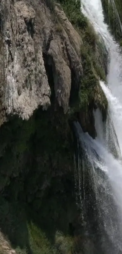 Vibrant scene featuring a waterfall over rocks.