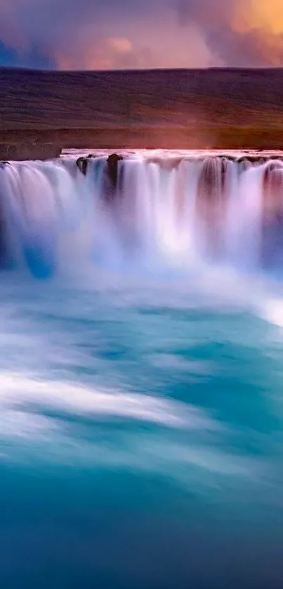 Turquoise waterfall scene with sunset sky, perfect for mobile wallpaper.