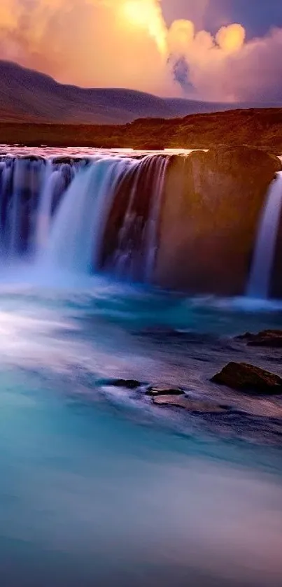 A stunning waterfall at sunset with vibrant blue and orange hues in the sky.