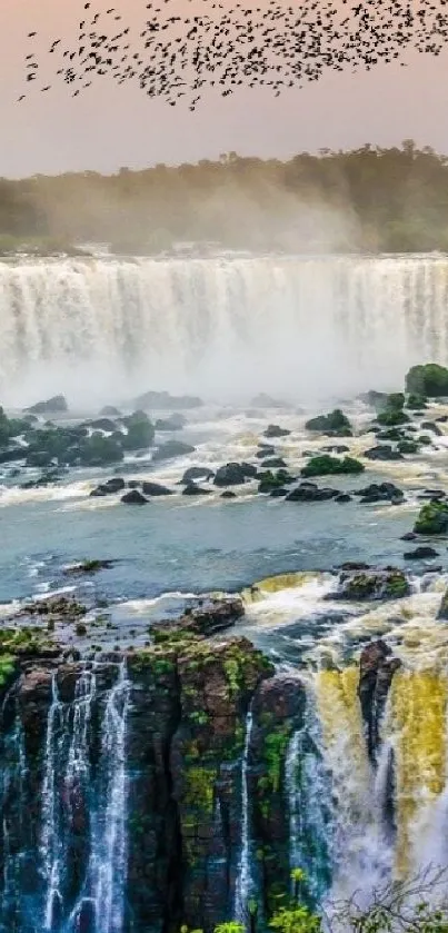 Beautiful waterfall with lush greenery and misty atmosphere.