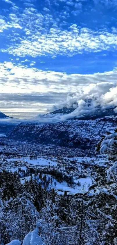 Snowy mountain vista with blue sky and clouds.