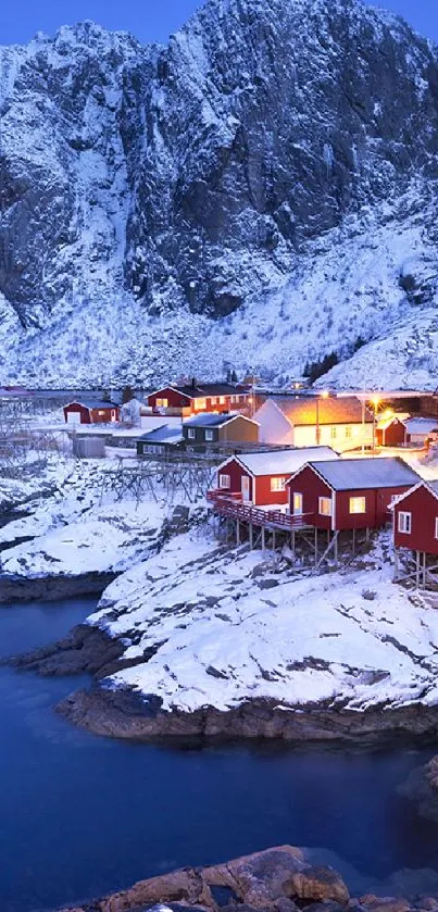 Breathtaking winter village by the mountains under a cobalt blue sky.