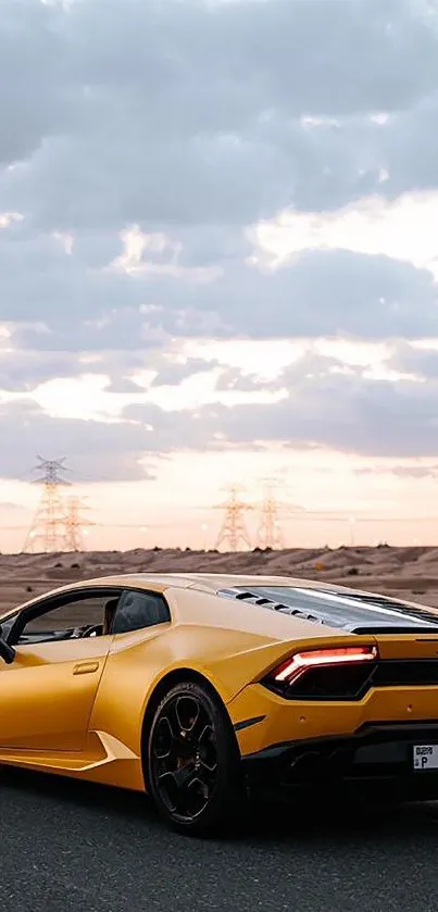 Yellow luxury sports car driving into the sunset.