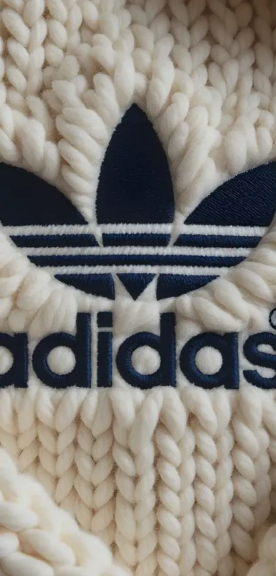 Adidas logo knit design wallpaper.
