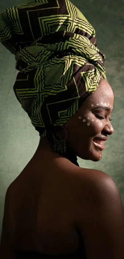 African woman with traditional headwrap in deep green tones.