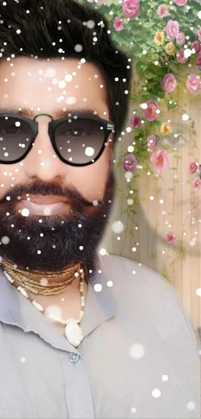 Man with beard and sunglasses, floral background.