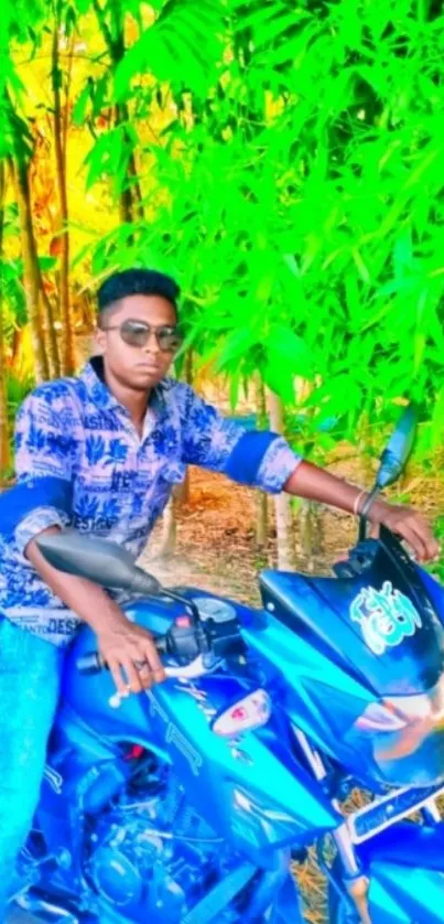 Man sitting on blue bike with vibrant green forest background.