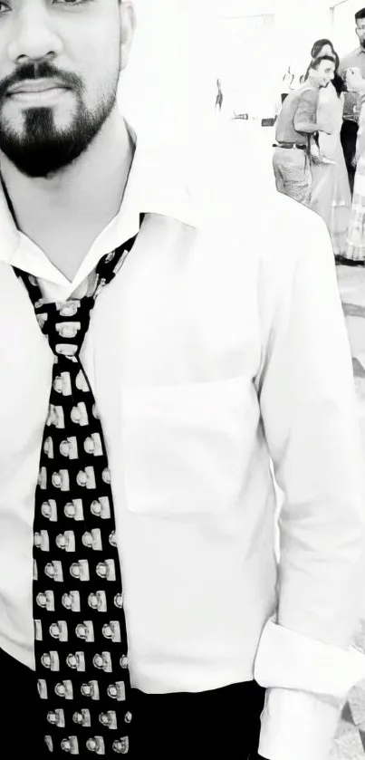 Black and white portrait of a stylish man in a unique tie.