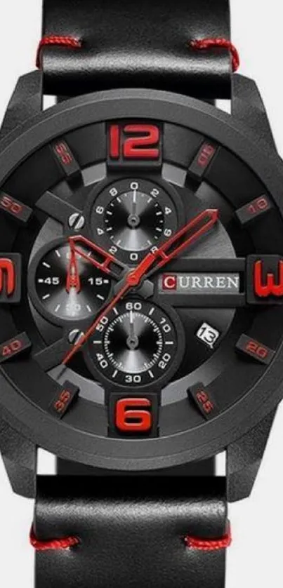 Stylish black watch with red accents on mobile wallpaper.