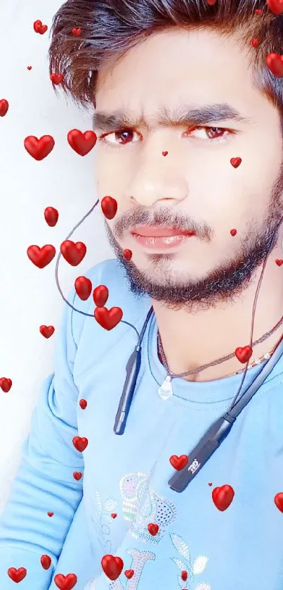 Portrait of a person in a blue sweater with earphones, stylish and casual.