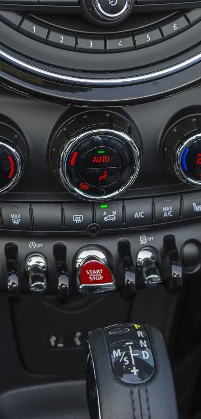 Car interior with modern dashboard controls, showcasing sleek design.