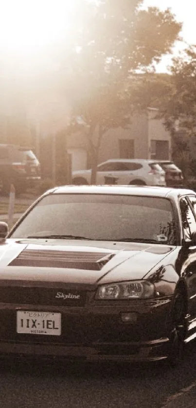 Stylish black car on a sepia-toned street with a warm, vintage atmosphere.