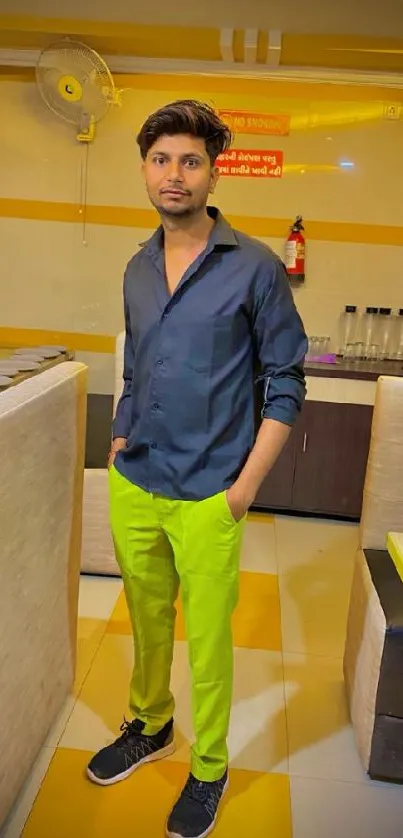 Person in a stylish casual outfit with bright colors and modern design.