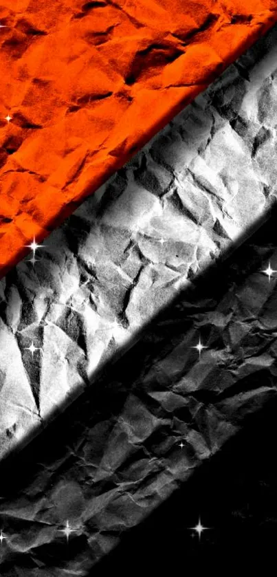 Abstract crumpled texture with orange, black, and white stripes.