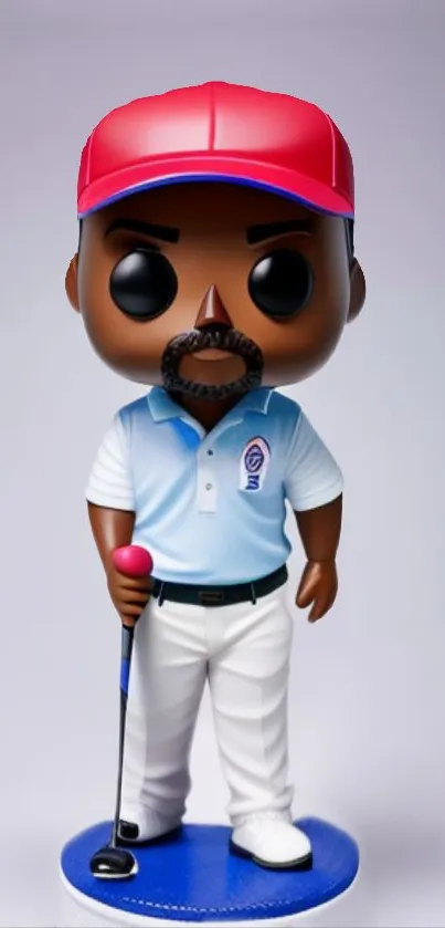 Golfer figurine with red cap and blue shirt on a blue base.