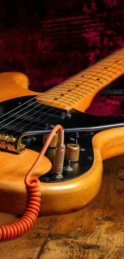 Wooden electric guitar on a vibrant background with coiled cable.