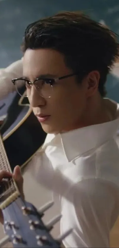 Stylish guitarist playing guitar in a cozy classroom setting.