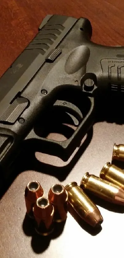 Dark handgun and bullets on a table.