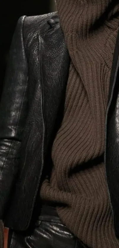 Fashionable leather jacket with brown turtleneck sweater.