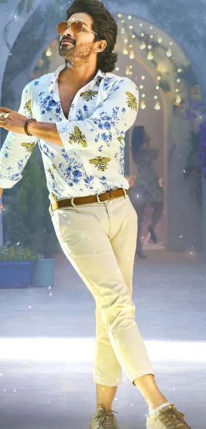 Stylish man in floral shirt, striking pose.