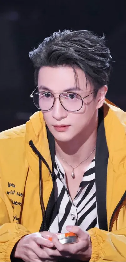 Stylish man wearing yellow jacket and glasses.