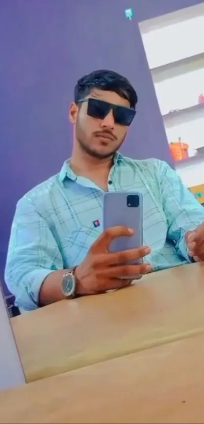 Stylish man taking a selfie with sunglasses.