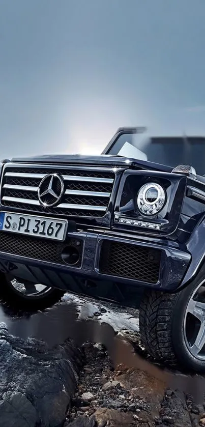 Mercedes SUV on rocky terrain, luxury vehicle.