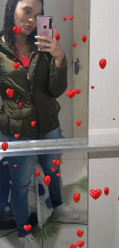 Stylish person taking a mirror selfie with phone.