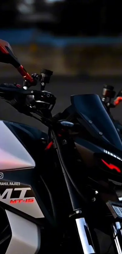 MT-15 motorcycle with sleek design in vibrant night setting.