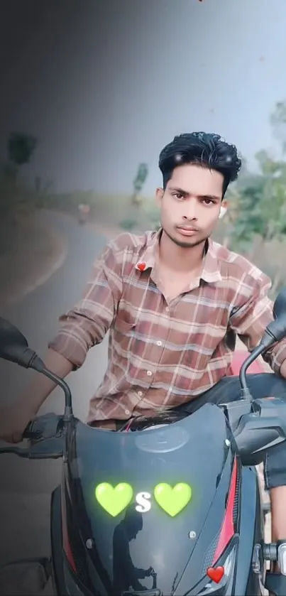 Young man on motorcycle scenic road