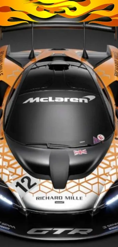 Dynamic orange McLaren racing car mobile wallpaper.